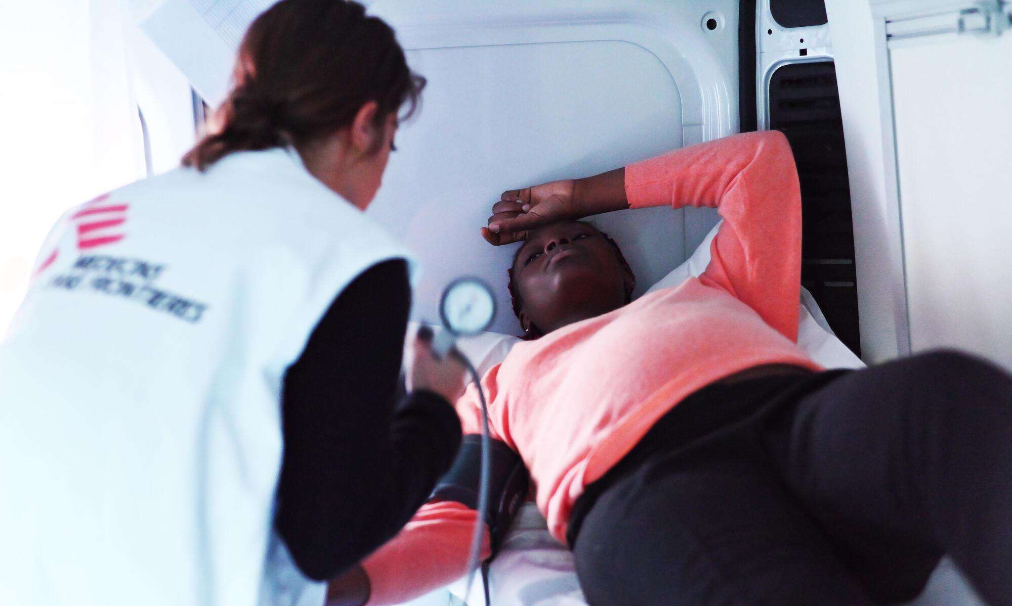 MSF widwife, Alessia Alberani, during a consultation with a pregnant patient in the mobile clinic in Ventimiglia, Italy