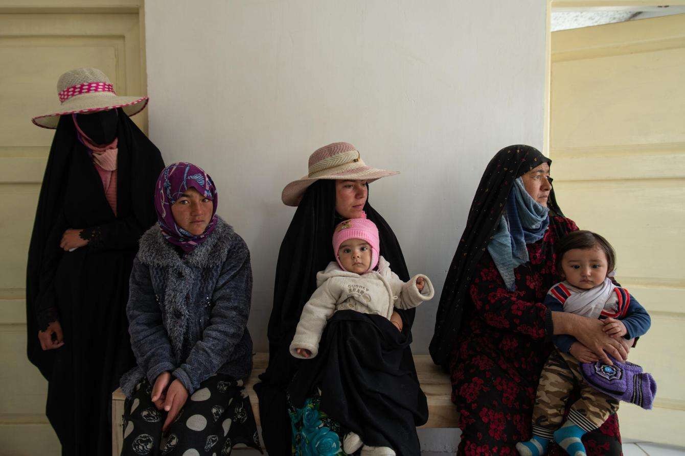Women and children wait for treatment at an MSF health facility in Afghanistan.