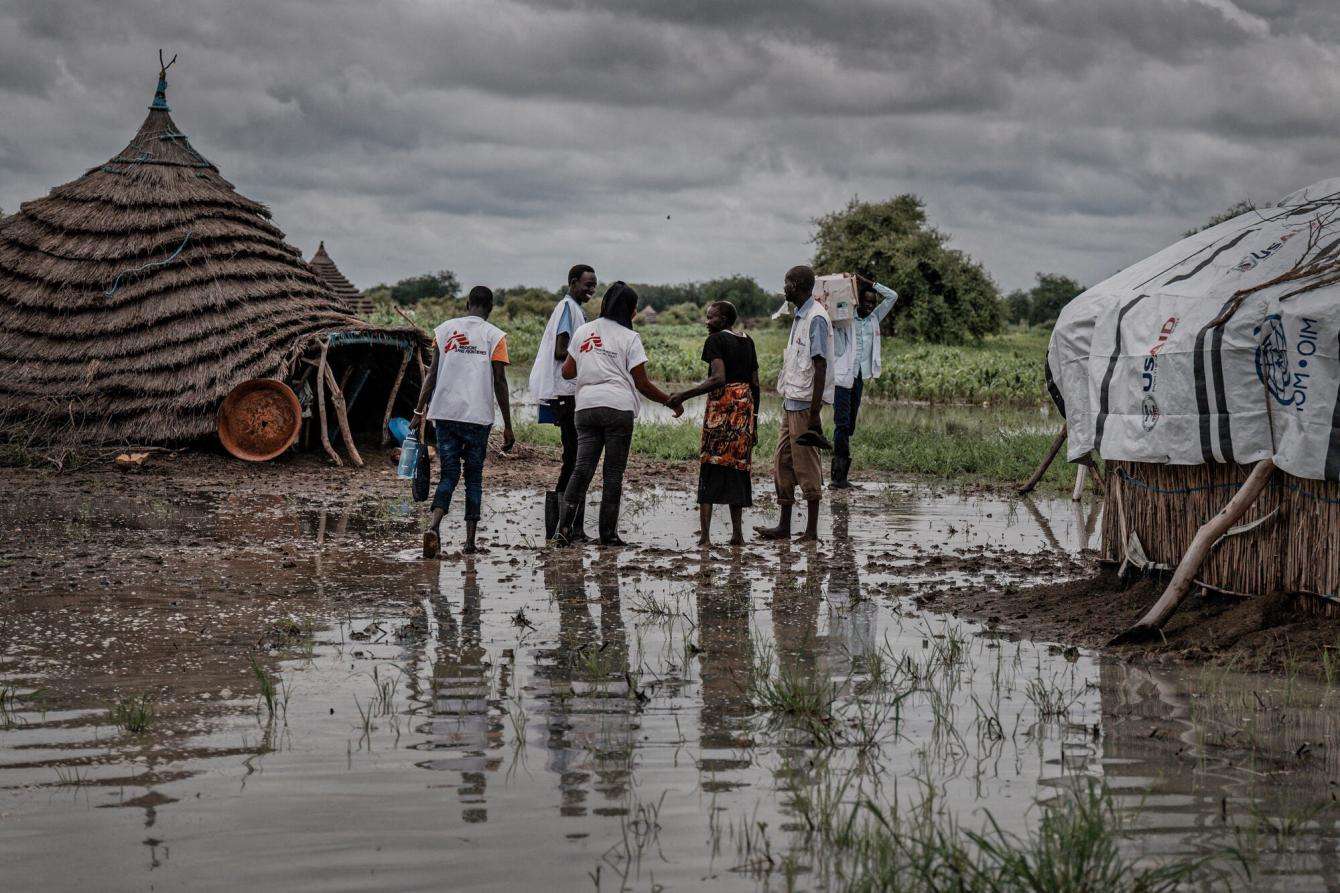 The MSF team wades through floodwater in Abyei, South Sudan