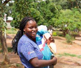 Marvellous Nzenza and her baby